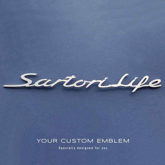Sartori Life Emblem made of 100% stainless steel ready to be installed on a Porsche
