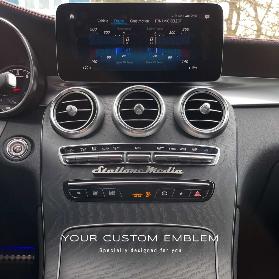 Stallone Media Emblem in stainless steel matt finishing on the AMG dashboard