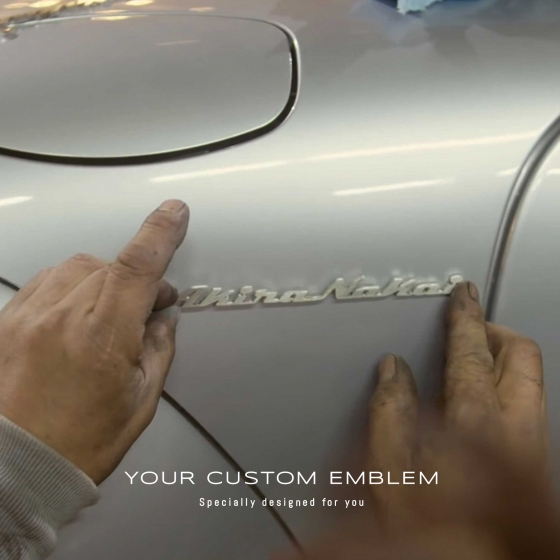 Akira Nakai installing his own Emblem on his personal RWB Porsche