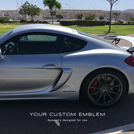 Issam Jandali's Custom Made Emblem painted in black installed on his Porsche Cayman Gt4